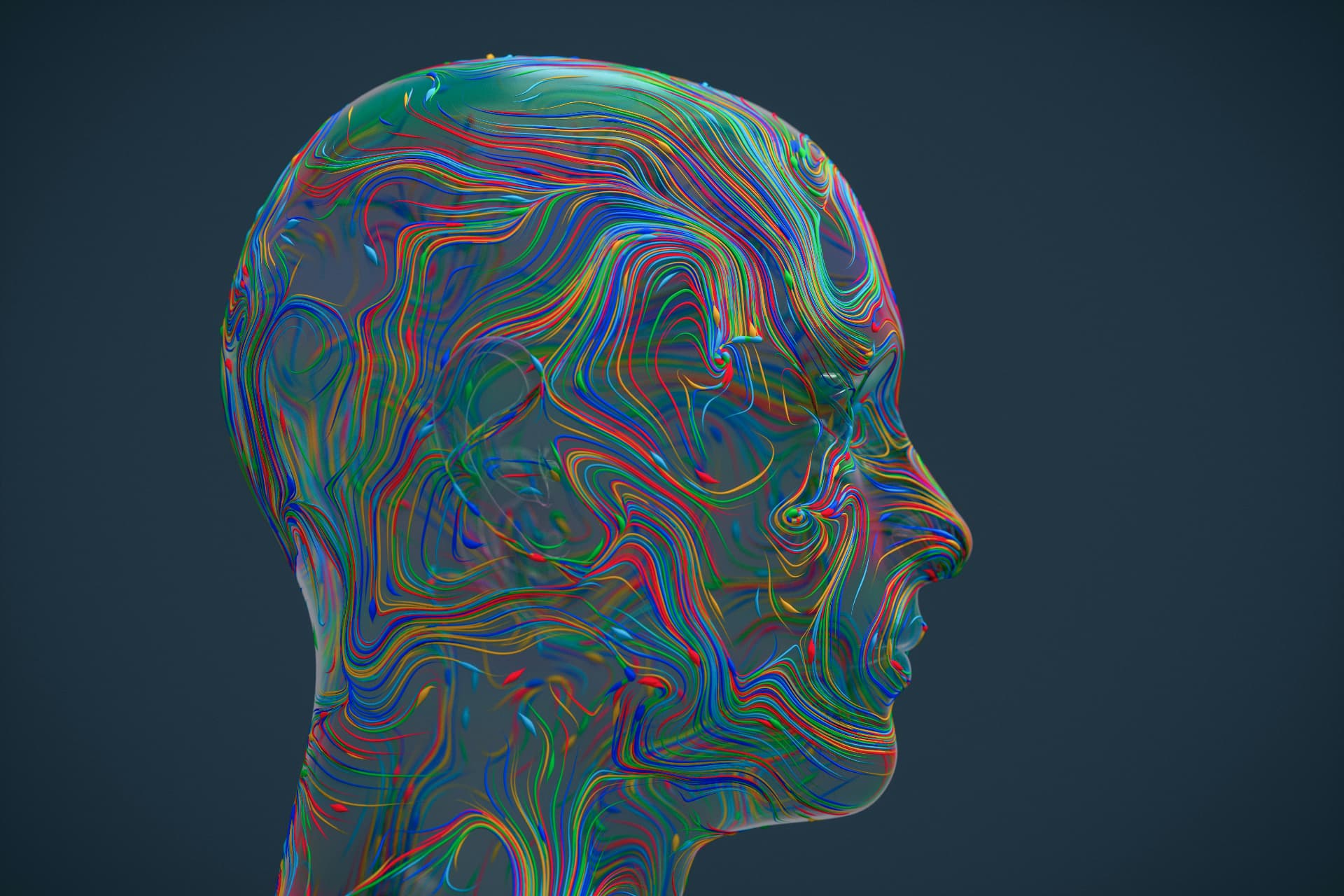 A translucent human head filled with flowing multicolored neural filaments against a dark background